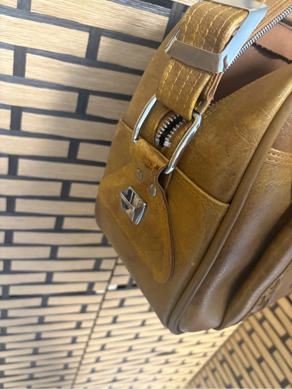 American tourister brown carry on bag